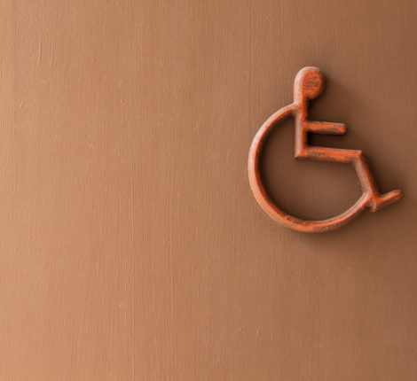 Social Security Disability Lawyer - disabled person sign on wall