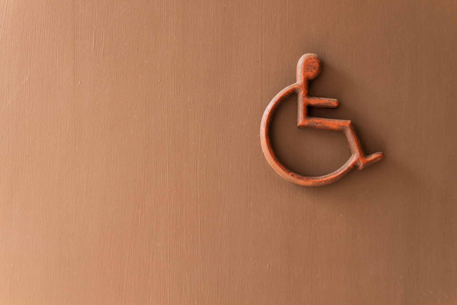Social Security Disability Lawyer - disabled person sign on wall