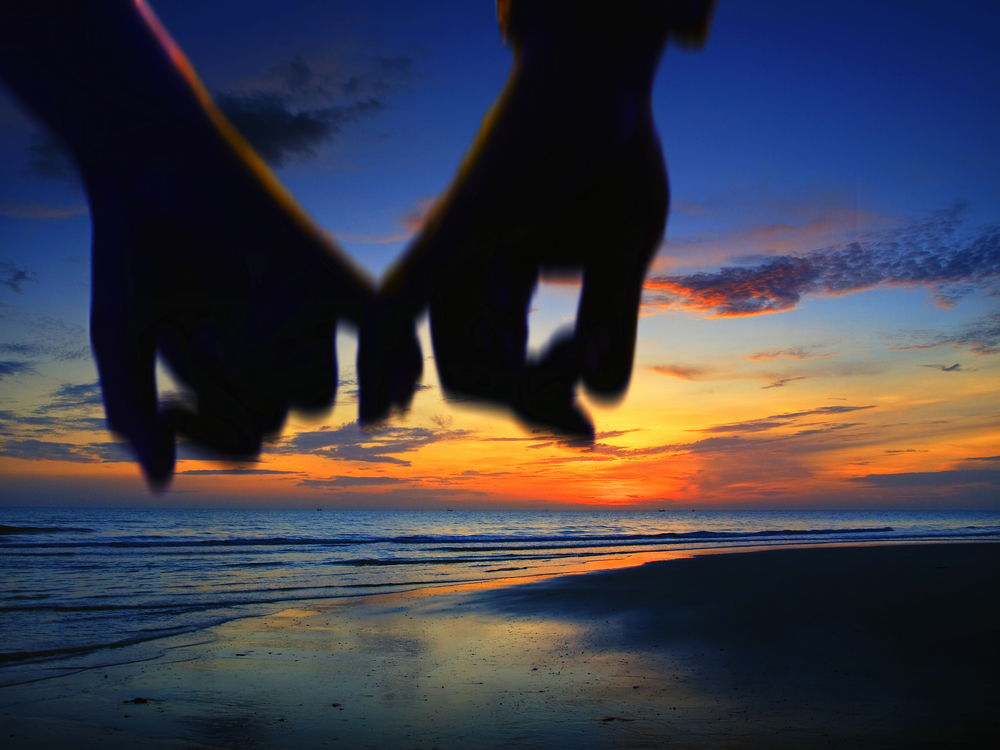 What Is the Meaning of Power of Attorney? - lover holding hand walking on the beach